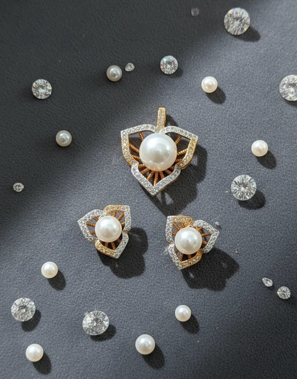 Golden Time Triangle Earrings & Pendant with Pearl and Cubic Zirconia.